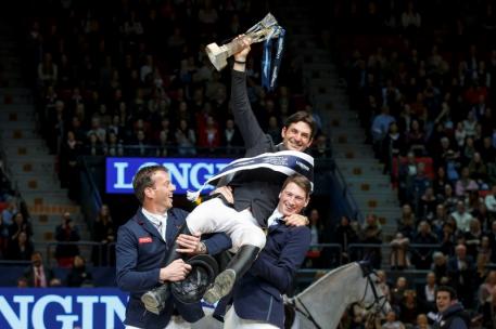 London 2012 Olympic champion Steve Guerdat of Switzerland is hosted aloft by runner-up Harrie Smolders (NED), left, and third-placed Daniel Deusser (GER), right after claiming victory in the Longines FEI World Cup™ Jumping Final in Gothenburg (SWE) today.
